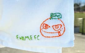 オ〜レくんの顔とEHIME FCの文字が刺繍されたタオル